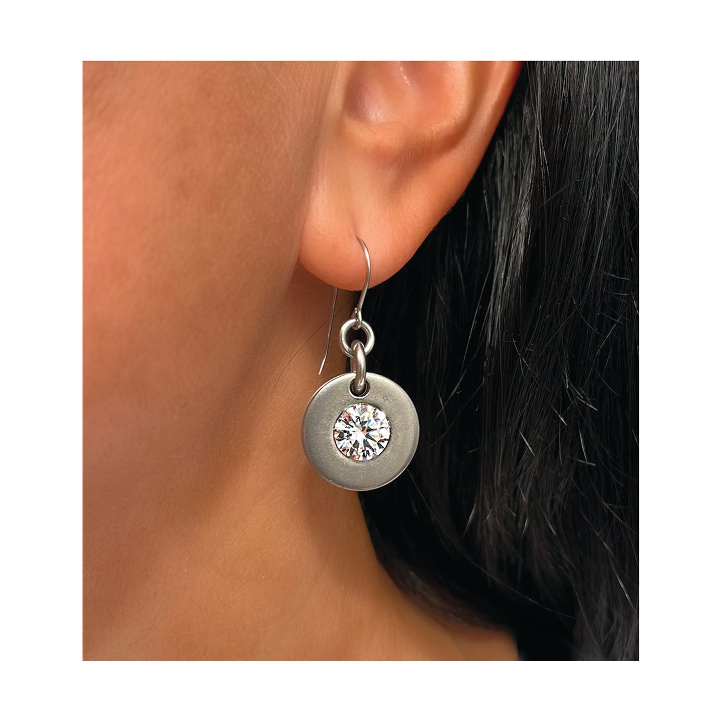 vela solitaire earrings