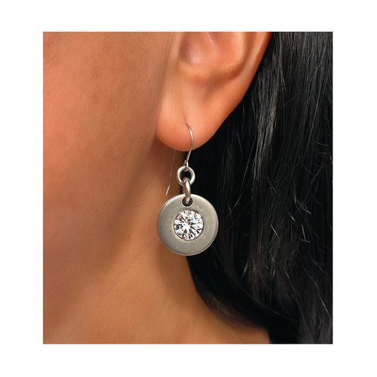 vela solitaire earrings