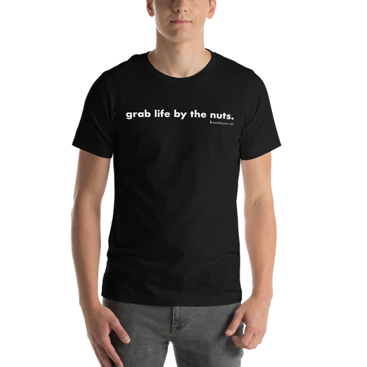 Person wearing a black t-shirt with text 'grab life by the nuts' on a white background